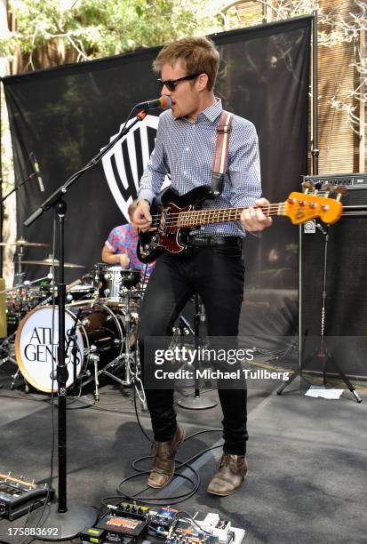 Bassist Steven Jeffery of Atlas Genius performs live at Warner Bros. Records Boutique Store on August 9, 2013 in Burbank, California.