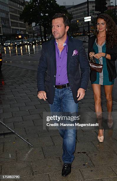 Lothar Matthaeus and his girlfriend Anastasia attend the Sky Bundesliga Season Opening Party at Heart on August 9, 2013 in Munich, Germany.