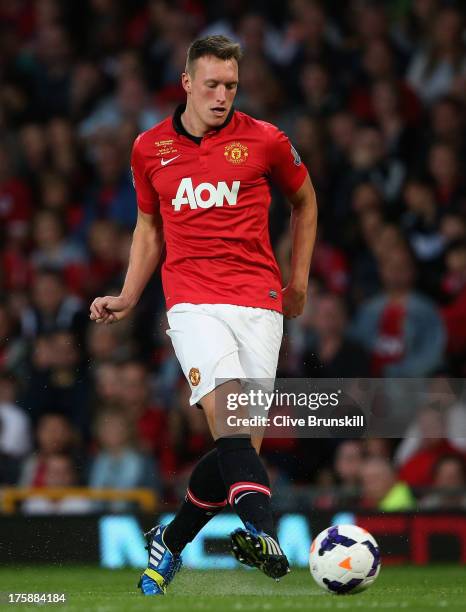 Phil Jones of Manchester United in action during the Rio Ferdinand Testimonial Match between Manchester United and Sevilla at Old Trafford on August...