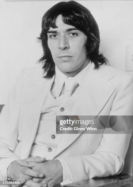 Welsh musician, composer and producer John Cale poses for a portrait wearing a 3 piece suit in circa 1971 in Los Angeles, California.