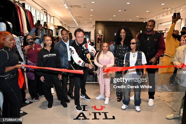 Zonnique Pullins, Michael Buckley, Tiny Harris, Cynthia Bailey, Heaven Anderson, and Paul Millsap attend True Religion ATL Grand Opening event at...