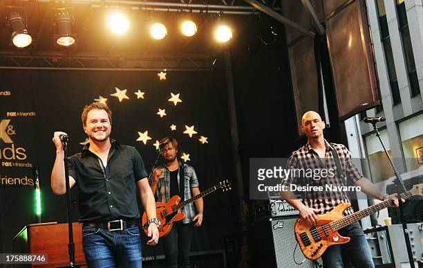 Mike Eli and bassist Jon Jones of the Eli Young Band perform during "FOX & Friends" All American Concert Series outside of FOX Studios on August 9,...