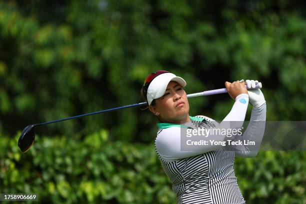 Jasmine Suwannapura of Thailand tees off on the 5th hole during the second round of the Maybank Championship at Kuala Lumpur Golf and Country Club on...