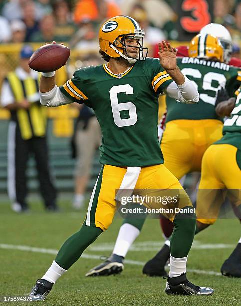 Graham Harrell of the Green Bay Packers passes against the Arizona Cardinals at Lambeau Field on August 9, 2013 in Green Bay, Wisconsin.