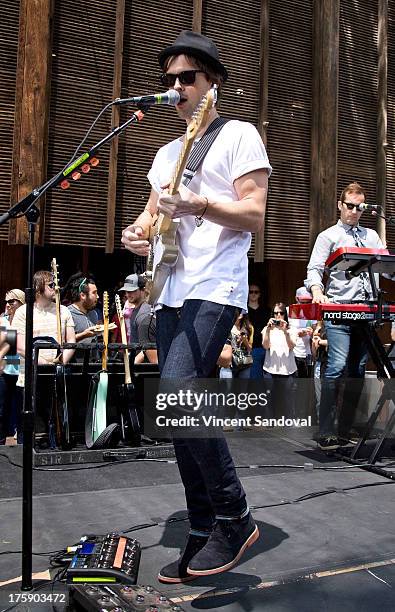 Singer/guitarist Keith Jeffery of Atlas Genius performs at the WBR Summer Sessions at Warner Bros. Records boutique store on August 9, 2013 in...