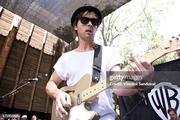 Singer/guitarist Keith Jeffery of Atlas Genius performs at the WBR Summer Sessions at Warner Bros. Records boutique store on August 9, 2013 in...