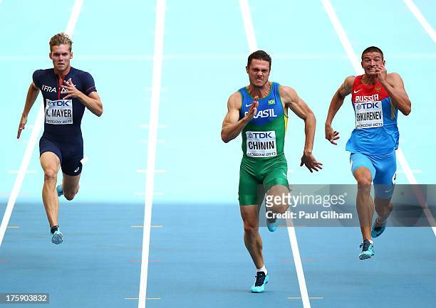 Kevin Mayer of France, Carlos Chinin of Brazil and Ilya Shkurenev of Russia compete in the Men's Decathlon 100 metres during Day One of the 14th IAAF...