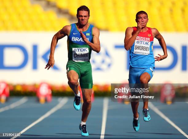 Carlos Chinin of Brazil and Ilya Shkurenev of Russia compete in the Men's Decathlon 100 metres during Day One of the 14th IAAF World Athletics...