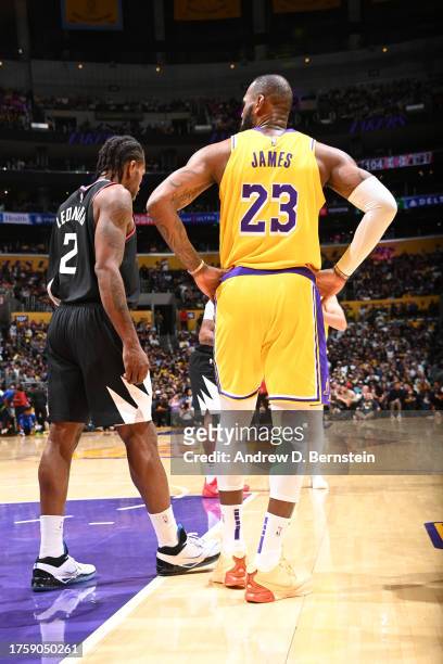 Kawhi Leonard of the LA Clippers and LeBron James of the Los Angeles Lakers look on during the game on November 1, 2023 at Crypto.Com Arena in Los...
