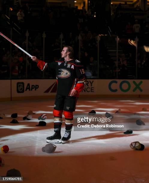 Troy Terry of the Anaheim Ducks celebrates after being named Play of the Game after his game winning goal and hat trick goal during overtime against...