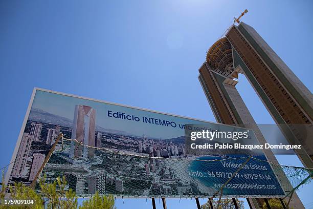 Billboard reading 'InTempo building. One reality. Know it' is displayed next to the InTempo building on August 9, 2013 in Benidorm, Spain. The...