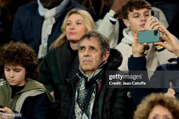 Julien Clerc, Anne Marivin attend the UEFA Champions League match between Paris Saint-Germain and AC Milan at Parc des Princes stadium on October 25,...