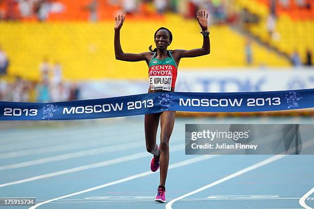 Edna Ngeringwony Kiplagat of Kenya crosses the line to win gold in the Women's Marathon during Day One of the 14th IAAF World Athletics Championships...