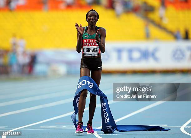 Edna Ngeringwony Kiplagat of Kenya crosses the line to win gold in the Women's Marathon during Day One of the 14th IAAF World Athletics Championships...