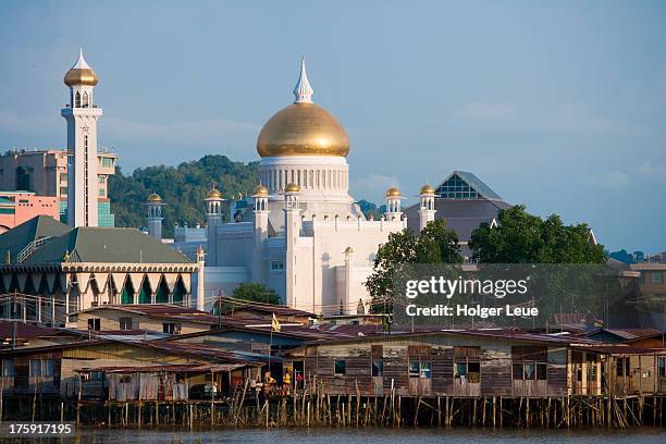 stilt houses and omar ali saifuddien mosque - brunei stock pictures, royalty-free photos & images