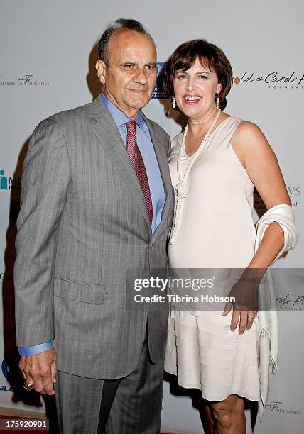 Joe Torre and Alice Wolterman attend the 13th annual Harold & Carole pump Foundation Gala at The Beverly Hilton Hotel on August 9, 2013 in Beverly...