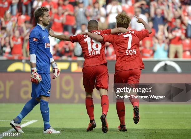 Oliver Baumann of Freiburg looks dejected after Heung-Min Son is scoring his teams second goal during the Bundesliga match between Bayer 04...