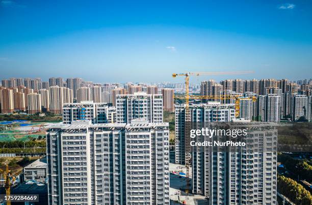 An aerial photo shows a resettlement housing construction project under construction in Hefei, Anhui province, China, November 1, 2023.