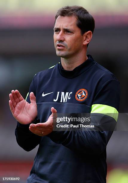 Manager Jackie McNamara of Dundee United claps during the Scottish Premier League match between Dundee United and Inverness Caledonian Thistle at...