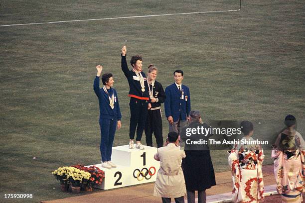 Gold Medalist Anne Packer of Great Britain, Silver Medalist Maryvonne Dupureur of France and Bronze Medalist Ann Chamberlain of New Zealand celebrate...