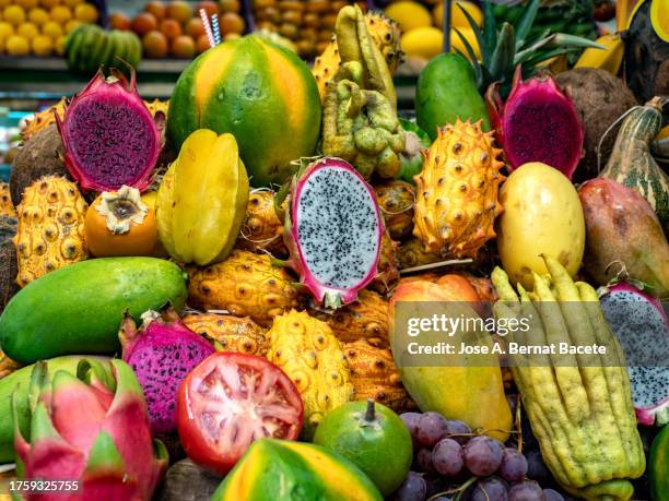 full frame of tropical and exotic fruits in a position of market. - oranges in basket at food market stock pictures, royalty-free photos & images