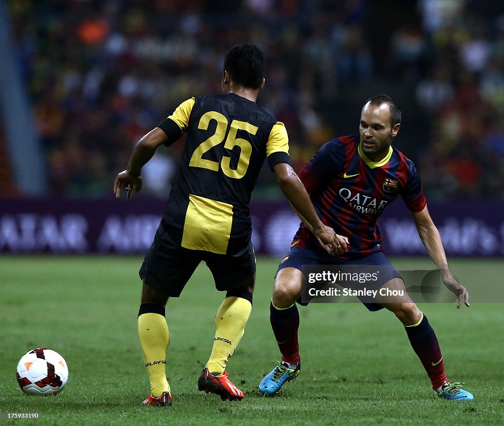 FC Barcelona v Malaysia XI