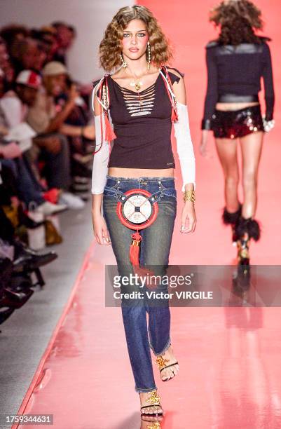 Ana Beatriz Barros walks the runway during the Baby Phat Ready to Wear Fall/Winter 2002-2003 fashion show as part of the New York Fashion Week on...