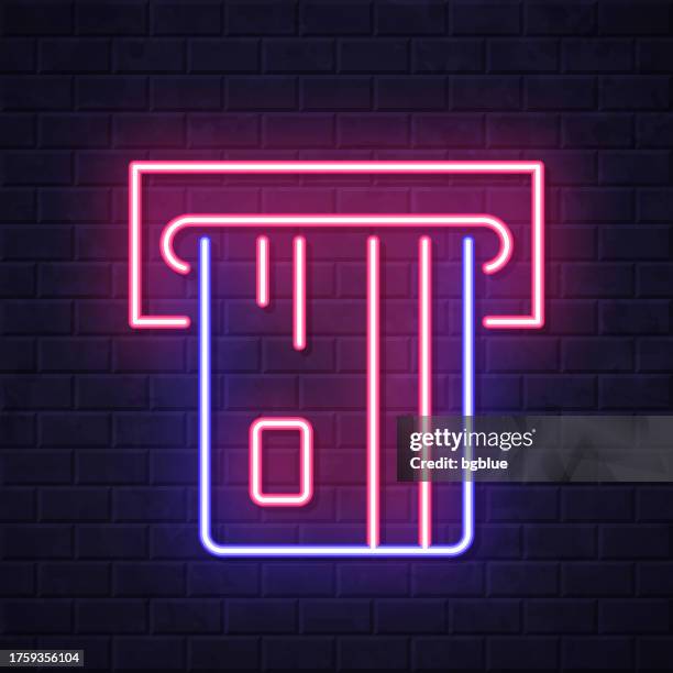 atm. glowing neon icon on brick wall background - modern bank teller stock illustrations