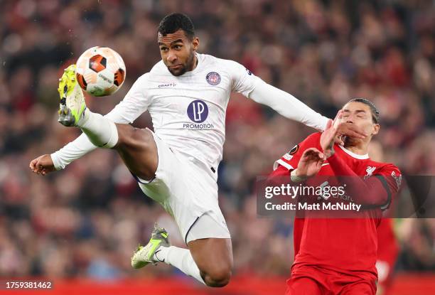 Cristian Casseres Jr of Toulouse controls the ball whilst under pressure from Darwin Nunez of Liverpool during the UEFA Europa League 2023/24 match...