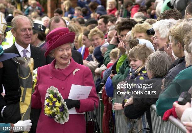 Britain's Queen Elizabeth II and the Duke of Edinburgh greet the public outside Lincoln Cathedral on Thursday 20 April 2000 following a service...