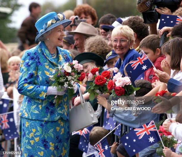 Britain's Queen Elizabeth II receives an enthusiastic welcome from the residents of the outback town of Bourke, some 900 kilometers northwest of...