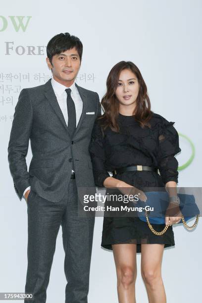 South Korean actors Jang Dong-Gun and Ko So-Young arrive for wedding ceremony of Lee Byung-Hun and Rhee Min-Jung at the Hyatt Hotel on August 10,...