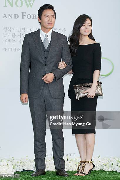 South Korean actors Yeon Jung-Hoon and Han Ga-In arrive for wedding ceremony of Lee Byung-Hun and Rhee Min-Jung at the Hyatt Hotel on August 10, 2013...