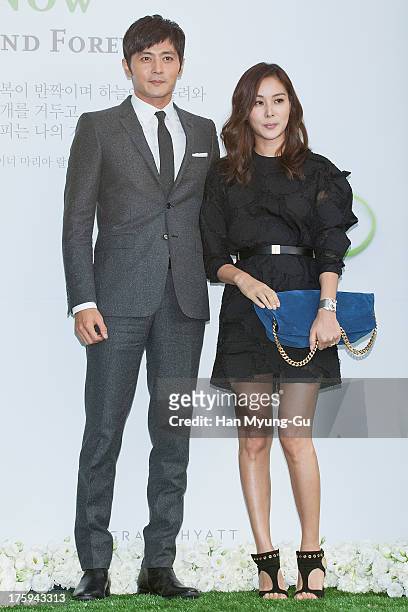 South Korean actors Jang Dong-Gun and Ko So-Young arrive for wedding ceremony of Lee Byung-Hun and Rhee Min-Jung at the Hyatt Hotel on August 10,...