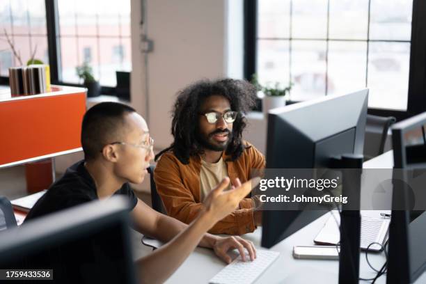 on the job training in modern loft office - desktop computer stock pictures, royalty-free photos & images