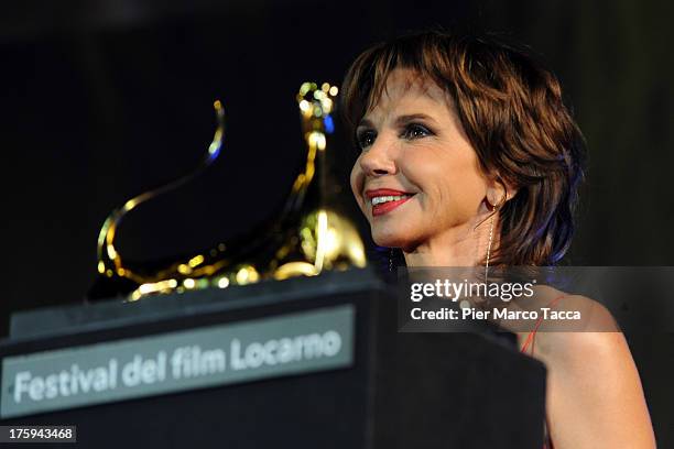 Actress Victoria Abril receives Excellence Award Moet Chandon during the 66th Locarno Film Festival on August 10, 2013 in Locarno, Switzerland.