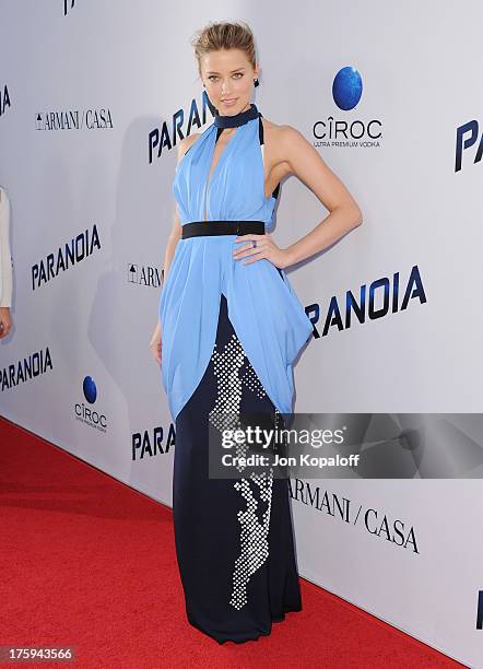 Actress Amber Heard arrives at the Los Angeles Premiere "Paranoia" at DGA Theater on August 8, 2013 in Los Angeles, California.