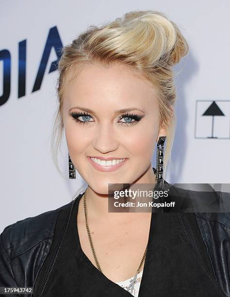 Actress Emily Osment arrives at the Los Angeles Premiere "Paranoia" at DGA Theater on August 8, 2013 in Los Angeles, California.