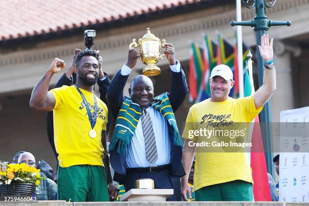 Captain Siya Kolisi, President Cyril Ramaphosa and head coach Jacques Nienaber lift the trophy during the Rugby World Cup 2023 Springbok Trophy Tour...