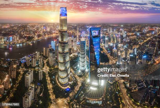 shanghai skyline at sunset - shanghai stock pictures, royalty-free photos & images