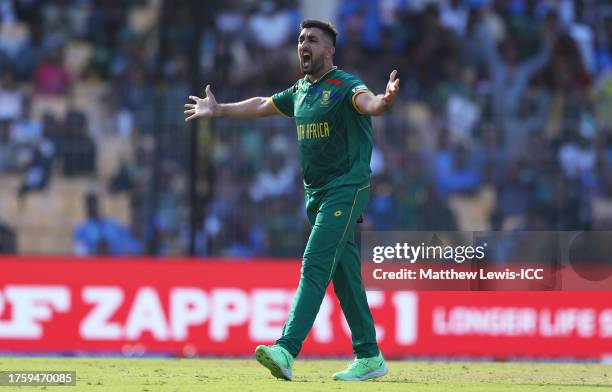 Tabraiz Shamsi of South Africa celebrates the wicket of Iftikhar Ahmed of Pakistan during the ICC Men's Cricket World Cup India 2023 between Pakistan...