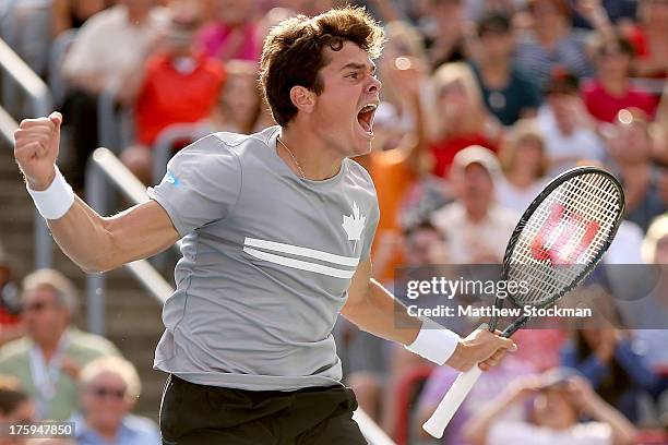 Milos Raonic of Canada celebrates match point against Vasek Pospisil of Canada during the semifinals of the Rogers Cup at Uniprix Stadium on August...