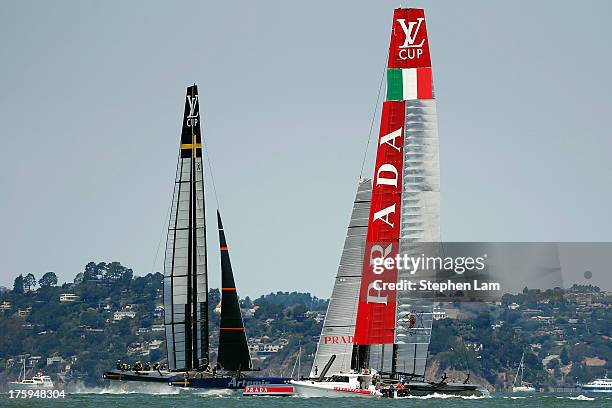 Team Artemis Racing skippered by Iain Percy and Team Luna Rossa Challenge skippered by Massimiliano Sirena take practice before the start of race...