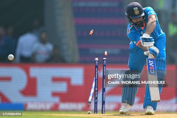 India's captain Rohit Sharma is clean bowled during the 2023 ICC Men's Cricket World Cup one-day international match between India and Sri Lanka at...