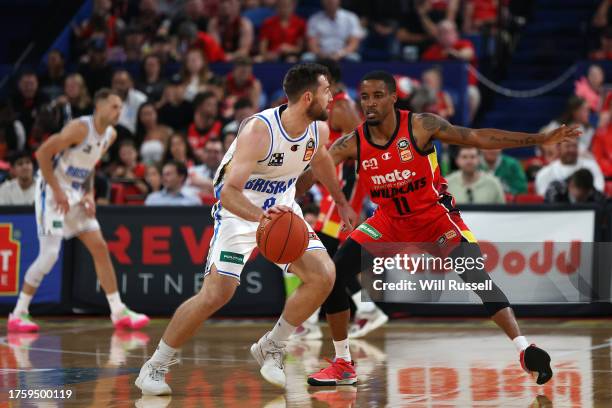 Mitch Norton of the Brisbane Bullets looks to pass the ball during the round five NBL match between Perth Wildcats and Brisbane Bullets at RAC Arena,...