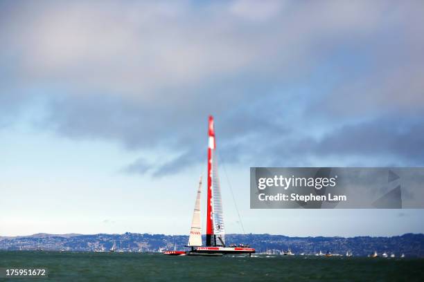 Team Luna Rossa Challenge skippered by Massimiliano Sirena competes against team Artemis Racing skippered by Iain Percy during race four of the Louis...