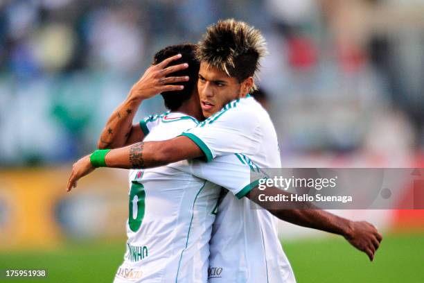 Juninho of Palmeiras celebrates a goal during a match between Palmeiras and Parana as part of the Brazilian Championship Serie B 2013 at Pacaembu...