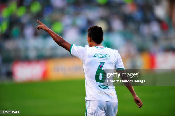 Juninho of Palmeiras celebrates a goal during a match between Palmeiras and Parana as part of the Brazilian Championship Serie B 2013 at Pacaembu...