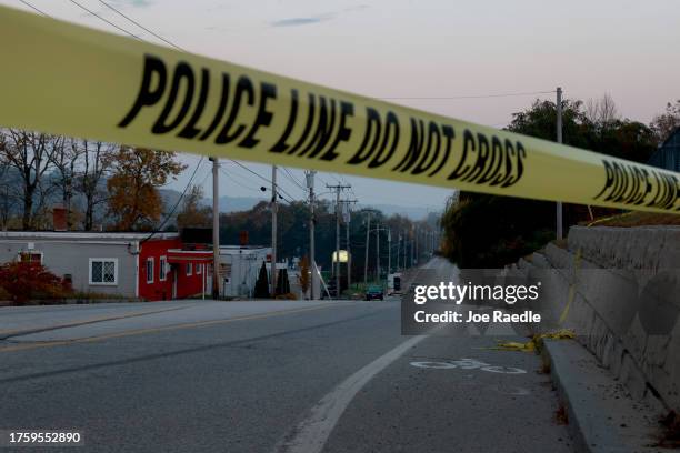 Law Enforcement officials continue their investigation at the Schemengees Bar where one of two mass shootings took place on October 27, 2023 in...