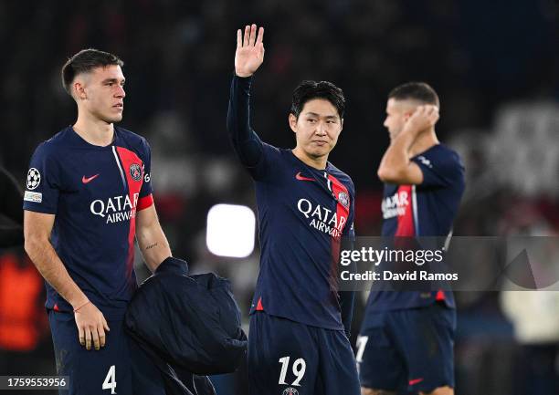 Lee Kang-in of Paris Saint-Germain celebrates at the end of the UEFA Champions League match between Paris Saint-Germain and AC Milan at Parc des...